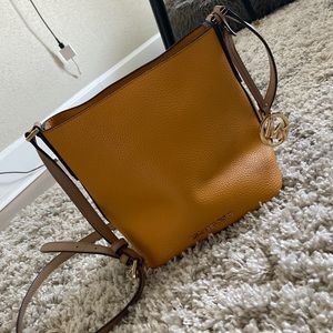 Michael Kors mustard bucket cross body bag